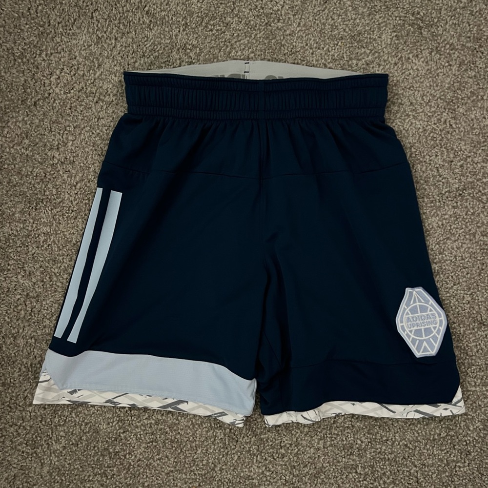Adidas Uprising Basketball Shorts for sale in a size large.